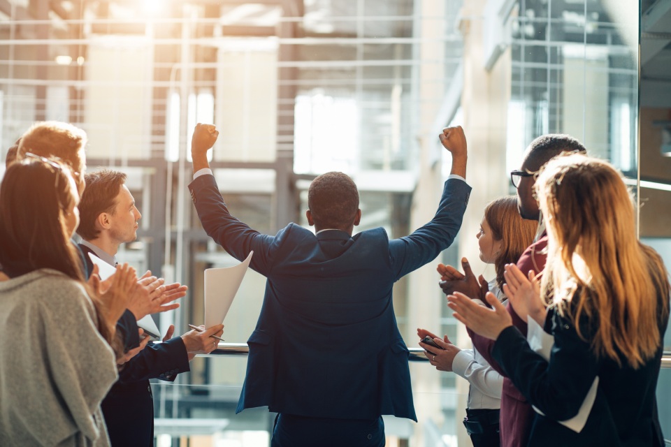 Business man cheering